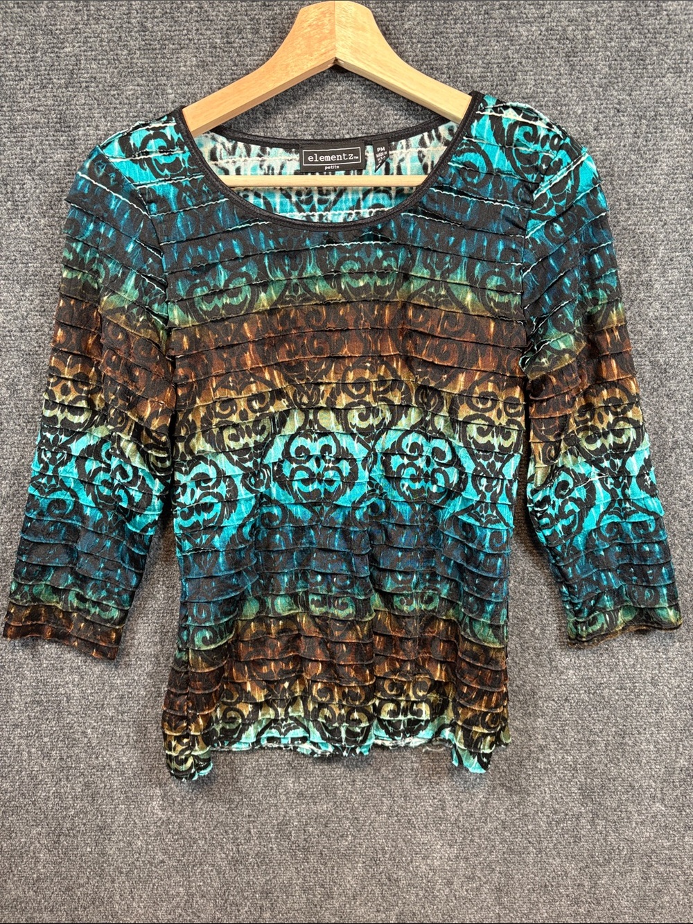 Elementz Teal Brown Black Patterned Ruffle Scoop-Neck Top
Size: Petite Medium